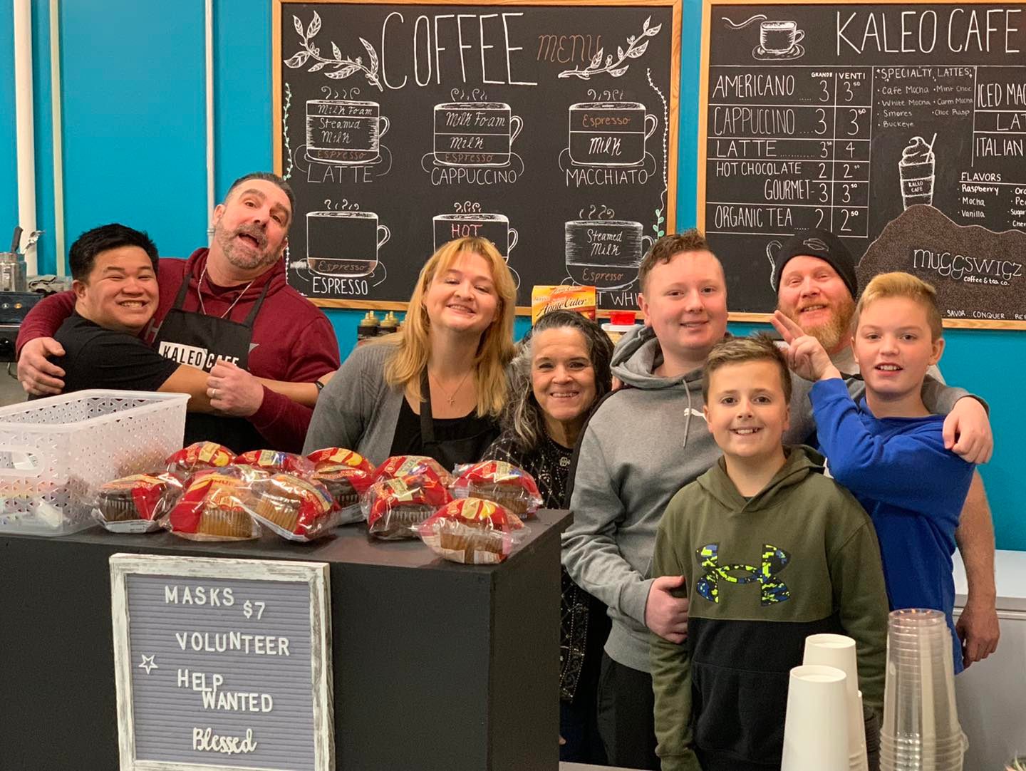 group of people standing at the counter at Kaleo Cafe at Compass North Church in Akron, Ohio